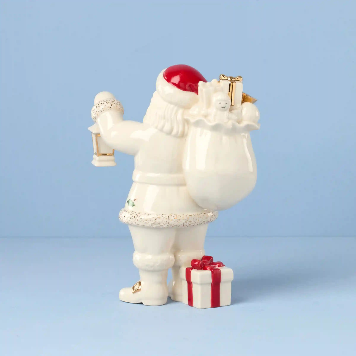 Santa with Lantern Figurine